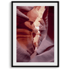 This beautiful Arizona desert wall art captures the mesmerizing beauty of Antelope Canyon. The picture showcases a passage through the rock in the canyon, with vibrant pink and purple textures that create a sense of depth and dimension.