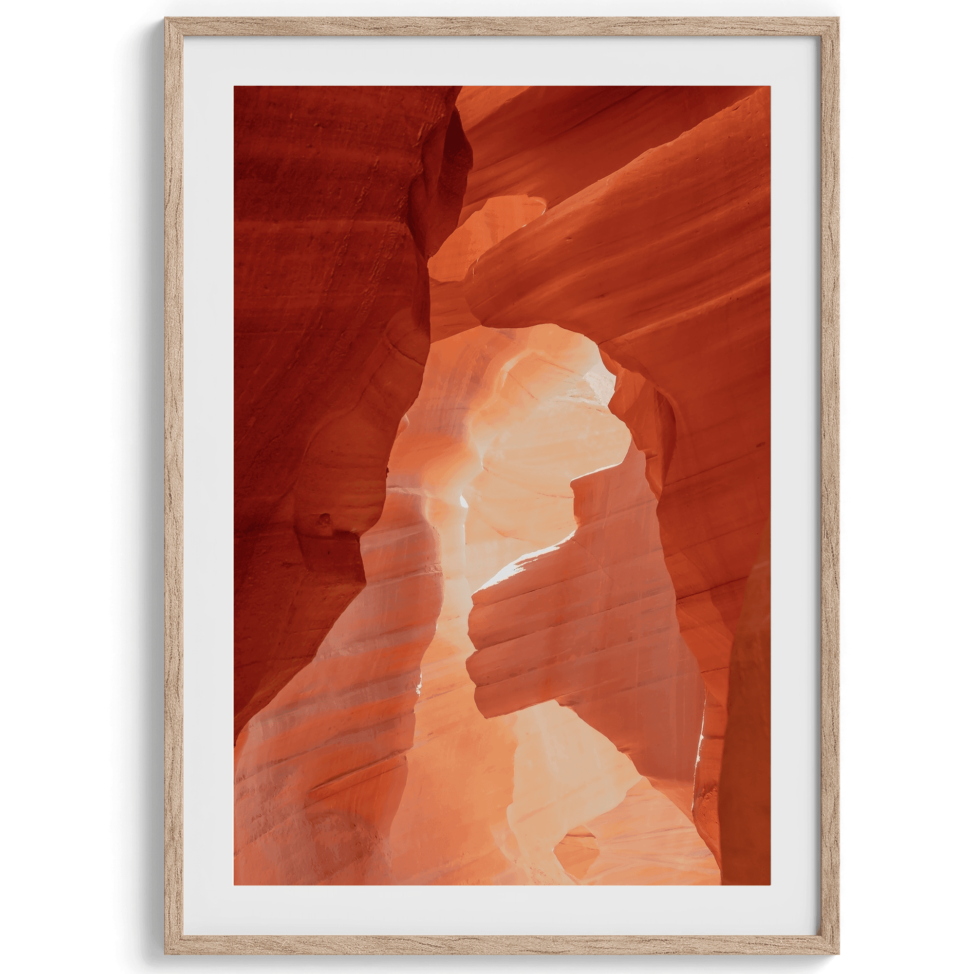 A fine art Arizona Desert print showcasing Antelope Canyon in Arizona. The three layers of rocks in varying colors and creamy textures create a stunning minimalist desert landscape, with vibrant reds and oranges adding warmth to any space.