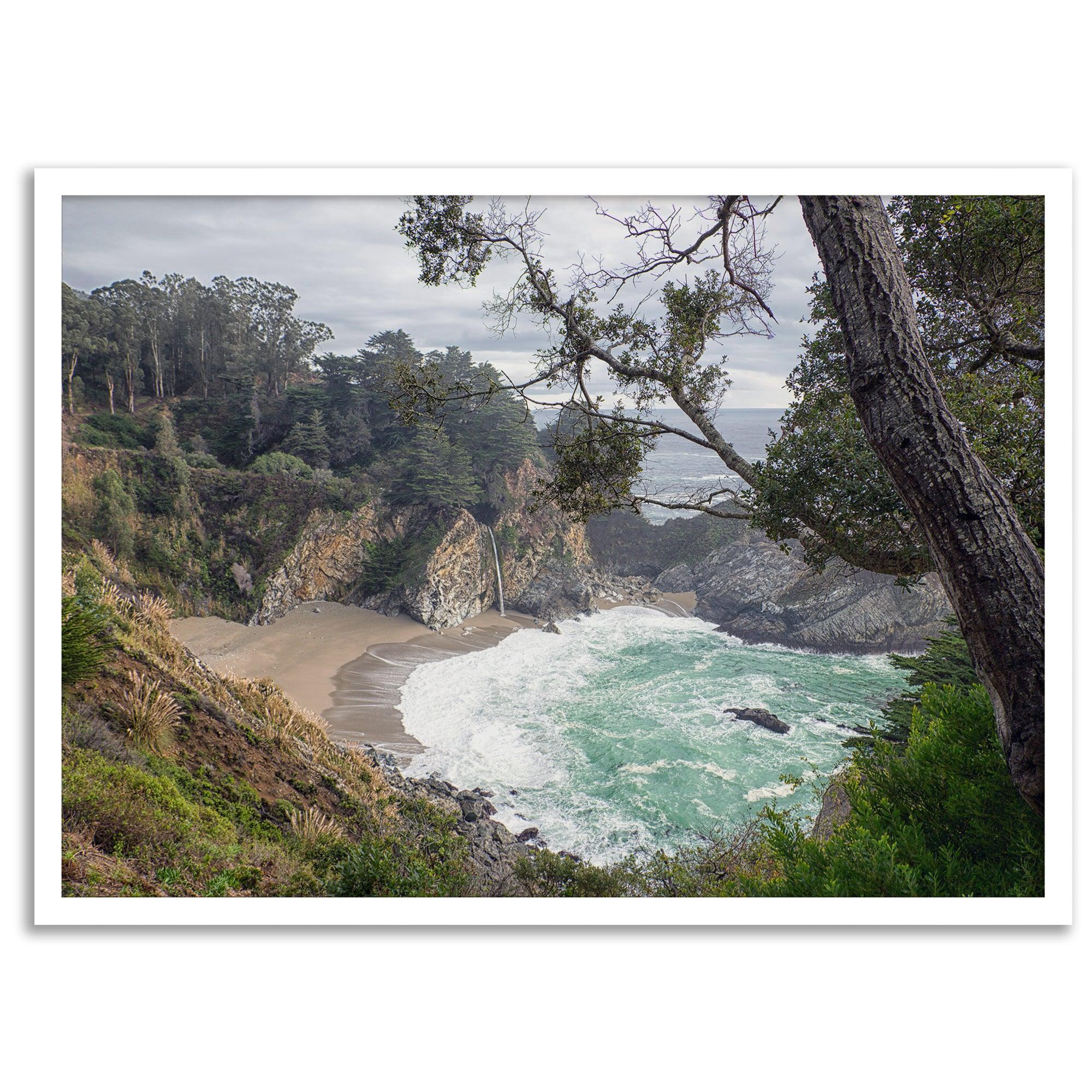 This fine art coastal ocean print features a breathtaking view of Mcway Falls in Big Sur, California, falling to the beach and into the ocean. This fine art photography print captures the beauty and wilderness of nature.