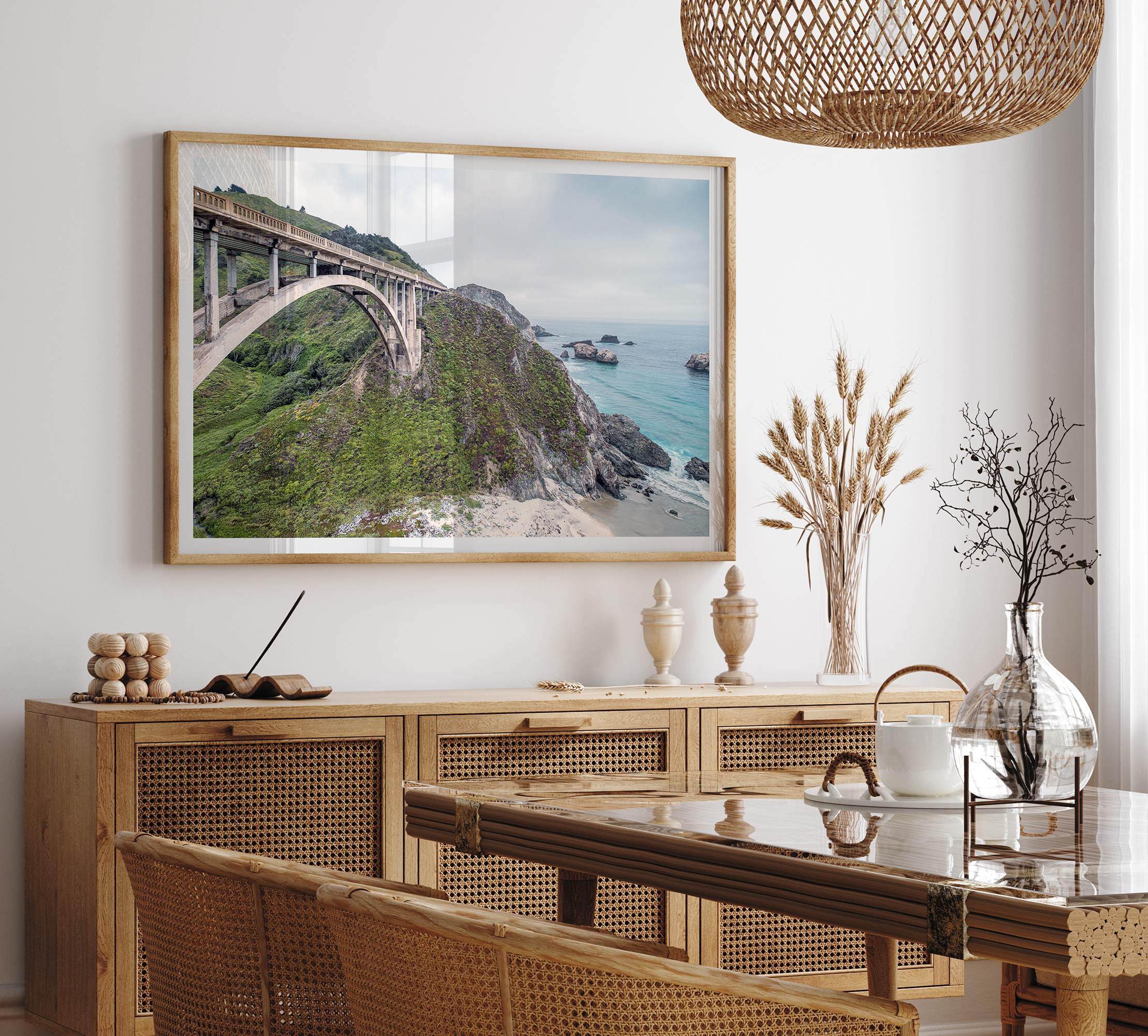 A fine art ocean print of one of the most iconic spots in the famous Route 1 in California - Bixby Bridge near Big Sur. Shot in a unique wide angle that captures the bridge, cliffs, the ocean, and the stunning beach below.