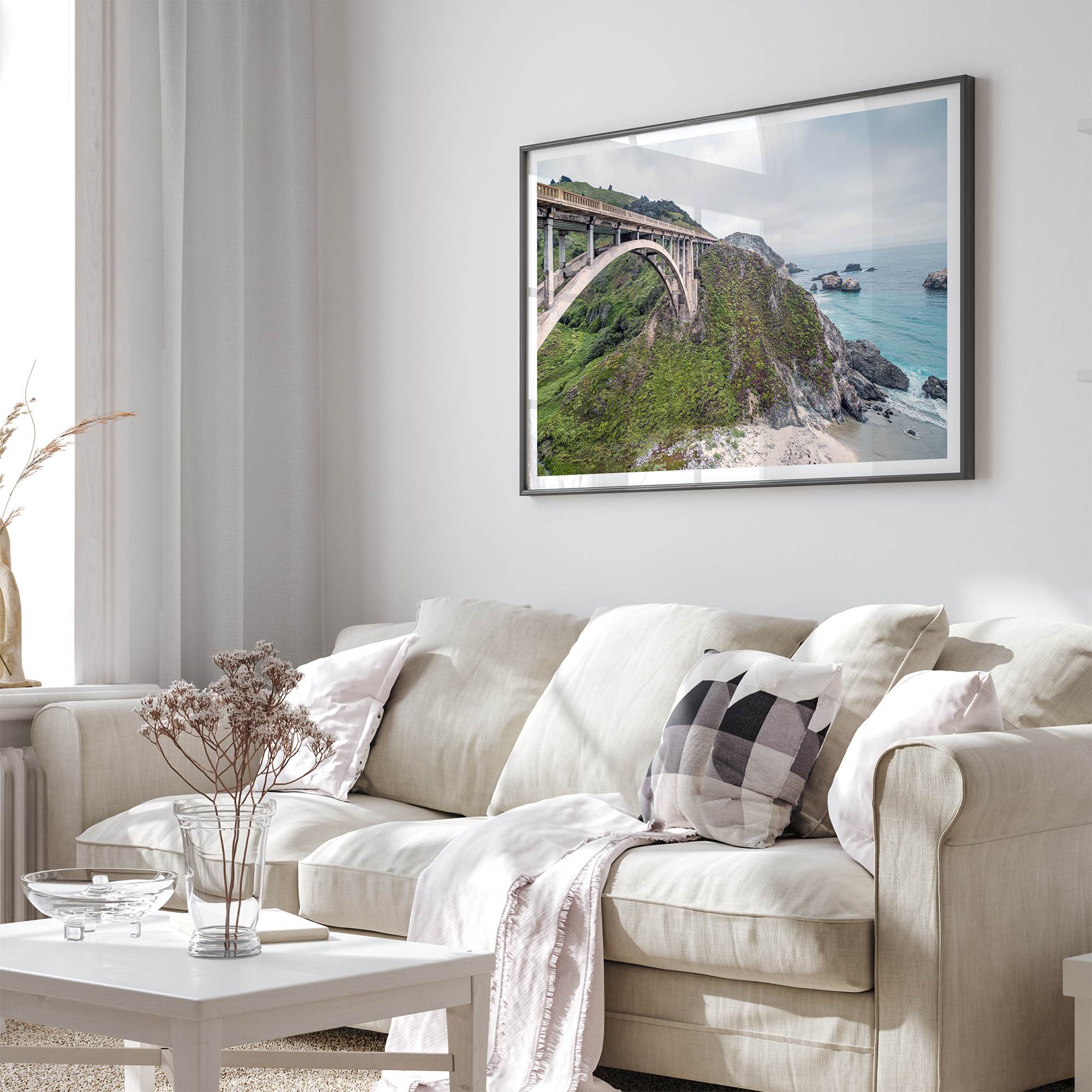 A fine art ocean print of one of the most iconic spots in the famous Route 1 in California - Bixby Bridge near Big Sur. Shot in a unique wide angle that captures the bridge, cliffs, the ocean, and the stunning beach below.