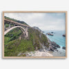 A fine art ocean print of one of the most iconic spots in the famous Route 1 in California - Bixby Bridge near Big Sur. Shot in a unique wide angle that captures the bridge, cliffs, the ocean, and the stunning beach below.