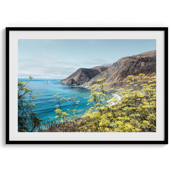 Coastal wall art featuring wildflowers and cliffs along Route #1 near Bixby Bridge in Big Sur.