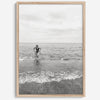 A black and white fine art lake beach print of a beach in Chicago on the coast of Lake Michigan showcasing a woman bathing in the lake. The classic modern look of the print is sure to impress when hung on your walls.