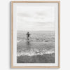 A black and white fine art lake beach print of a beach in Chicago on the coast of Lake Michigan showcasing a woman bathing in the lake. The classic modern look of the print is sure to impress when hung on your walls.