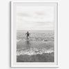 A black and white fine art lake beach print of a beach in Chicago on the coast of Lake Michigan showcasing a woman bathing in the lake. The classic modern look of the print is sure to impress when hung on your walls.