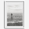 A black and white fine art lake beach print of a beach in Chicago on the coast of Lake Michigan showcasing a woman bathing in the lake. The classic modern look of the print is sure to impress when hung on your walls.