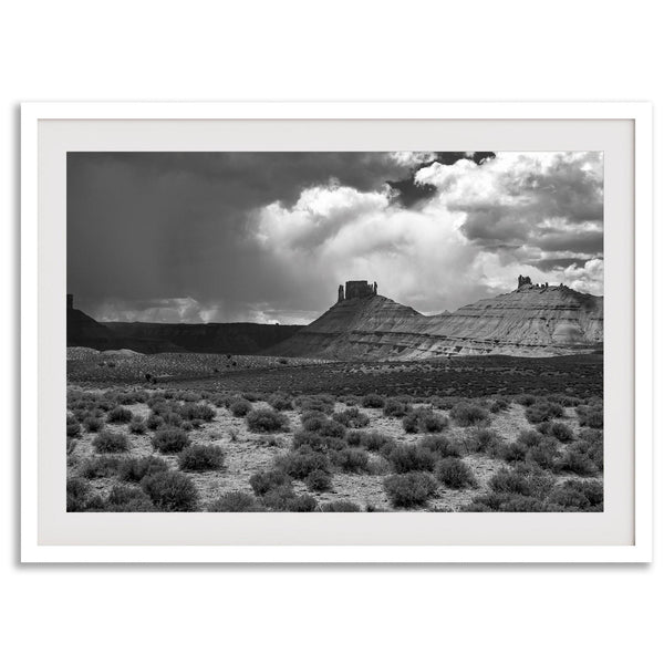 Black and white Utah wall art featuring dramatic desert rock formations and storm clouds