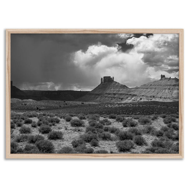 Black and white Utah wall art featuring dramatic desert rock formations and storm clouds