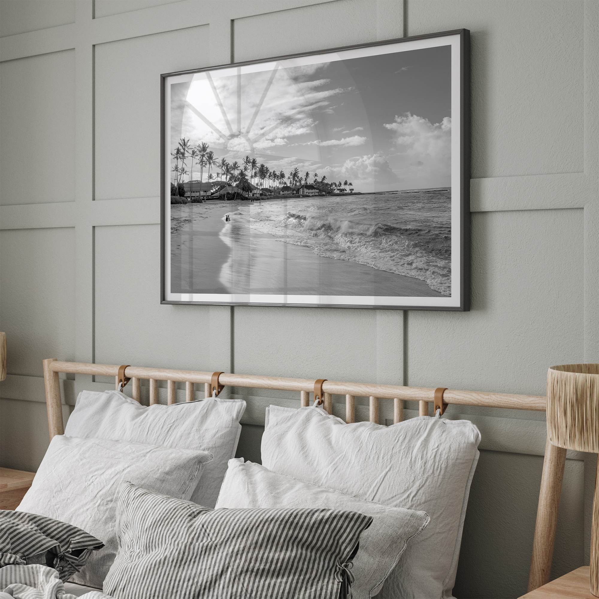 Black and white tropical wall art featuring a serene sunrise on a beach in Kauai, Hawaii with palm trees