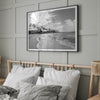 Black and white tropical wall art featuring a serene sunrise on a beach in Kauai, Hawaii with palm trees