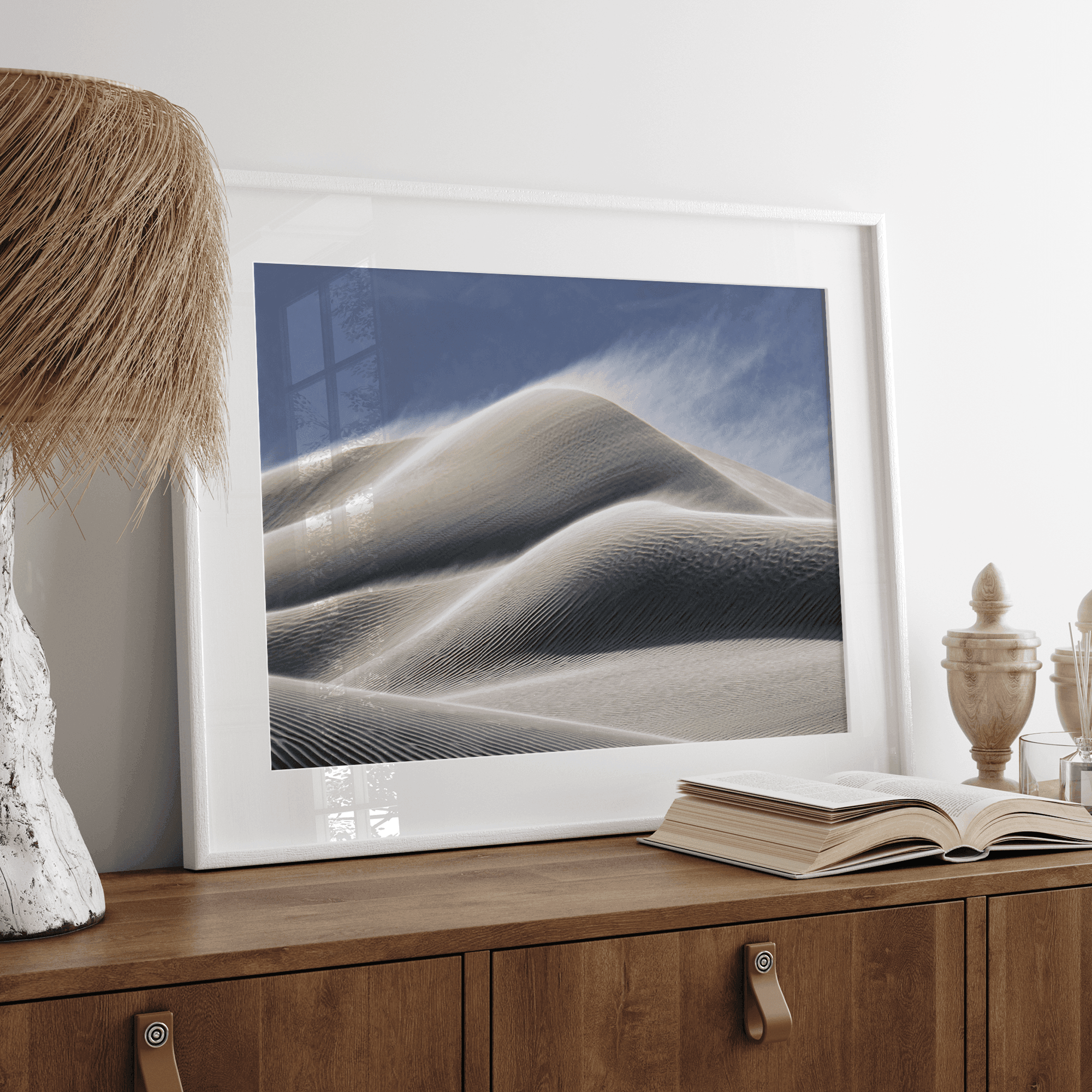 Fine art photo of Mesquite Flat Sand Dunes in Death Valley at golden hour. Windblown sand creates textured patterns across the immense dunes, bathed in warm light.