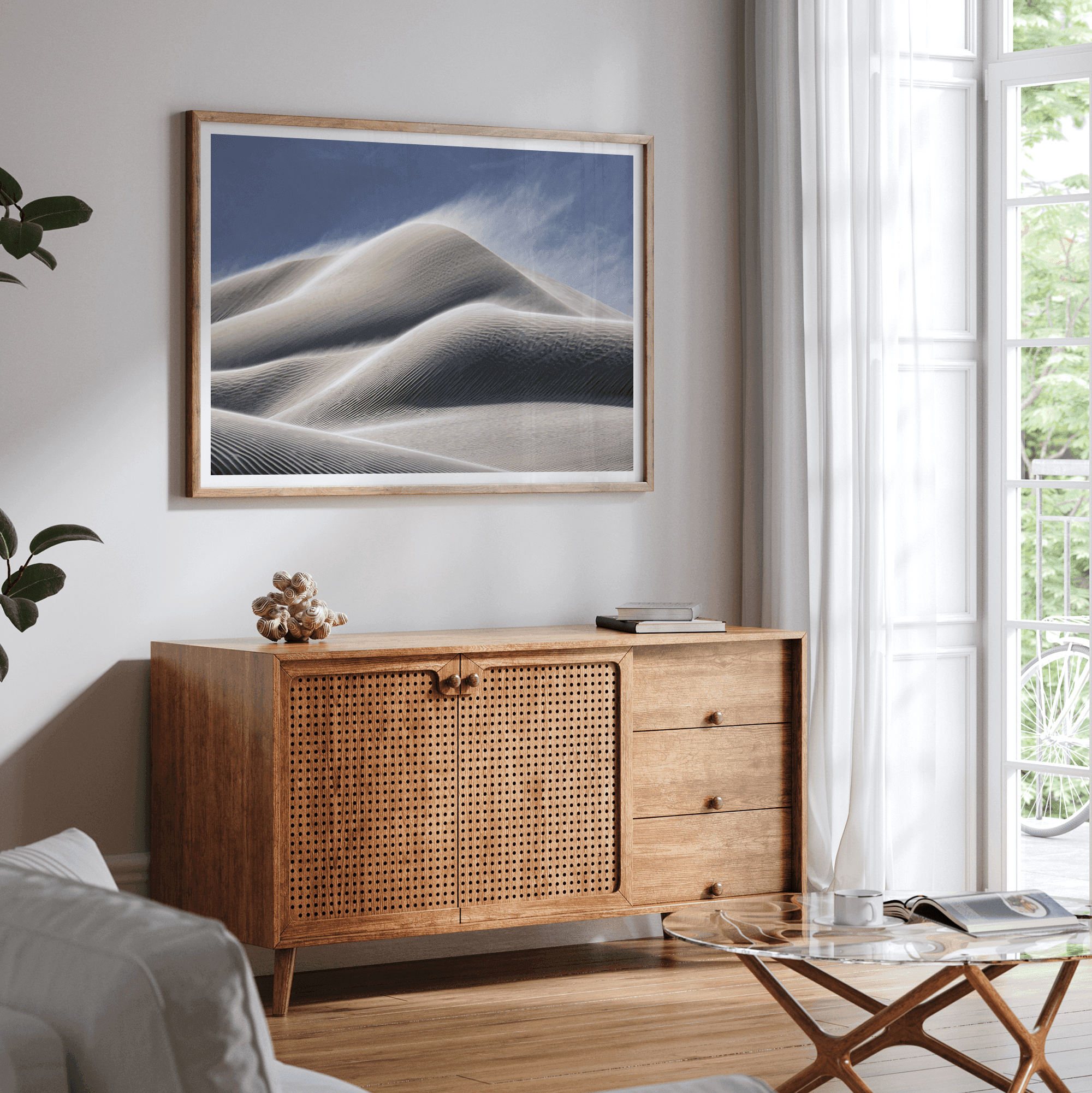 Fine art photo of Mesquite Flat Sand Dunes in Death Valley at golden hour. Windblown sand creates textured patterns across the immense dunes, bathed in warm light.