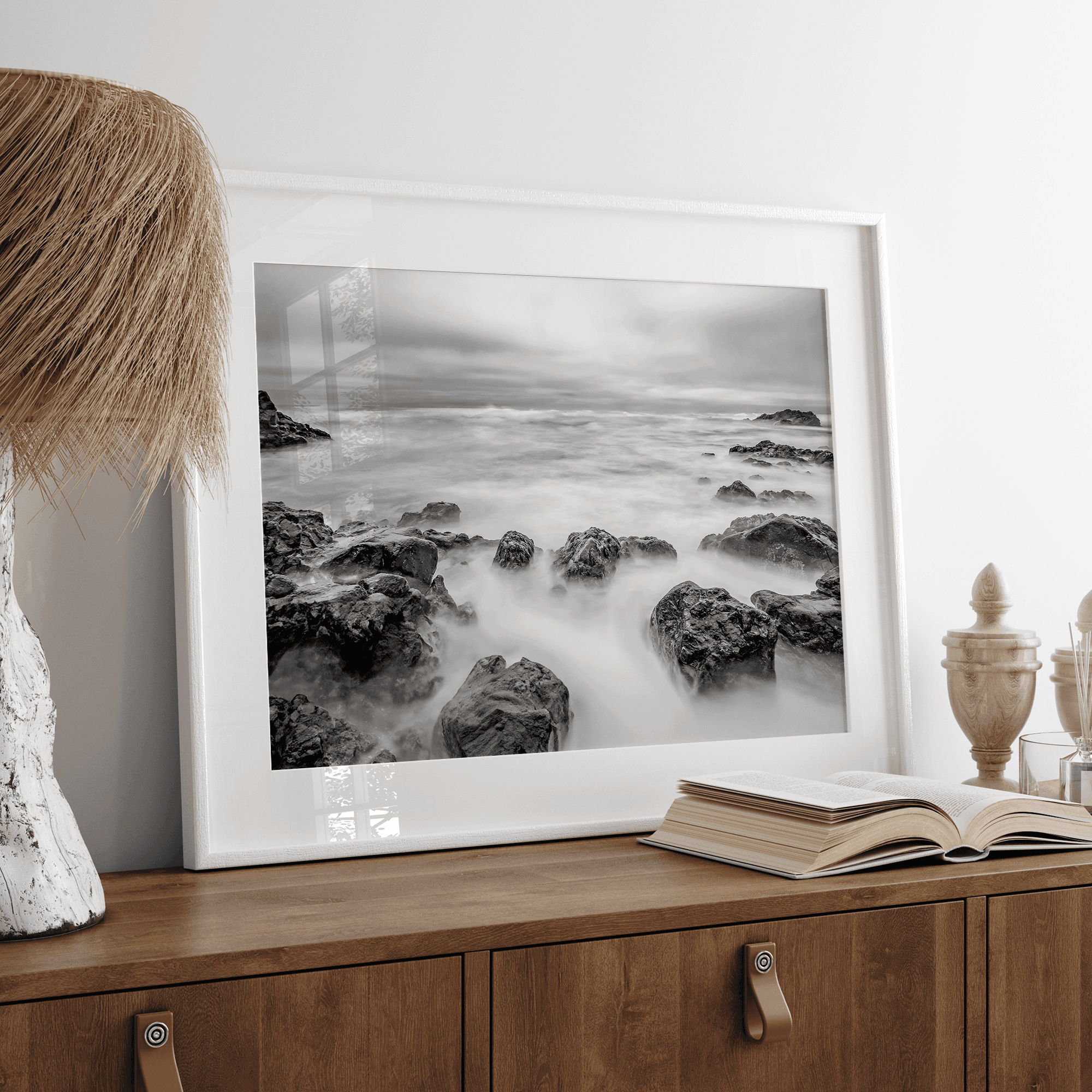 Stunning moody black and white beach fine art print from Pescadero, California. The Pacific Ocean looks creamy in this fine art long-exposure photography print.