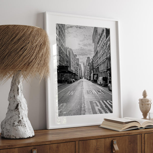 Black and white fine art print of a classic New York City street, showcasing the city's unique architecture.