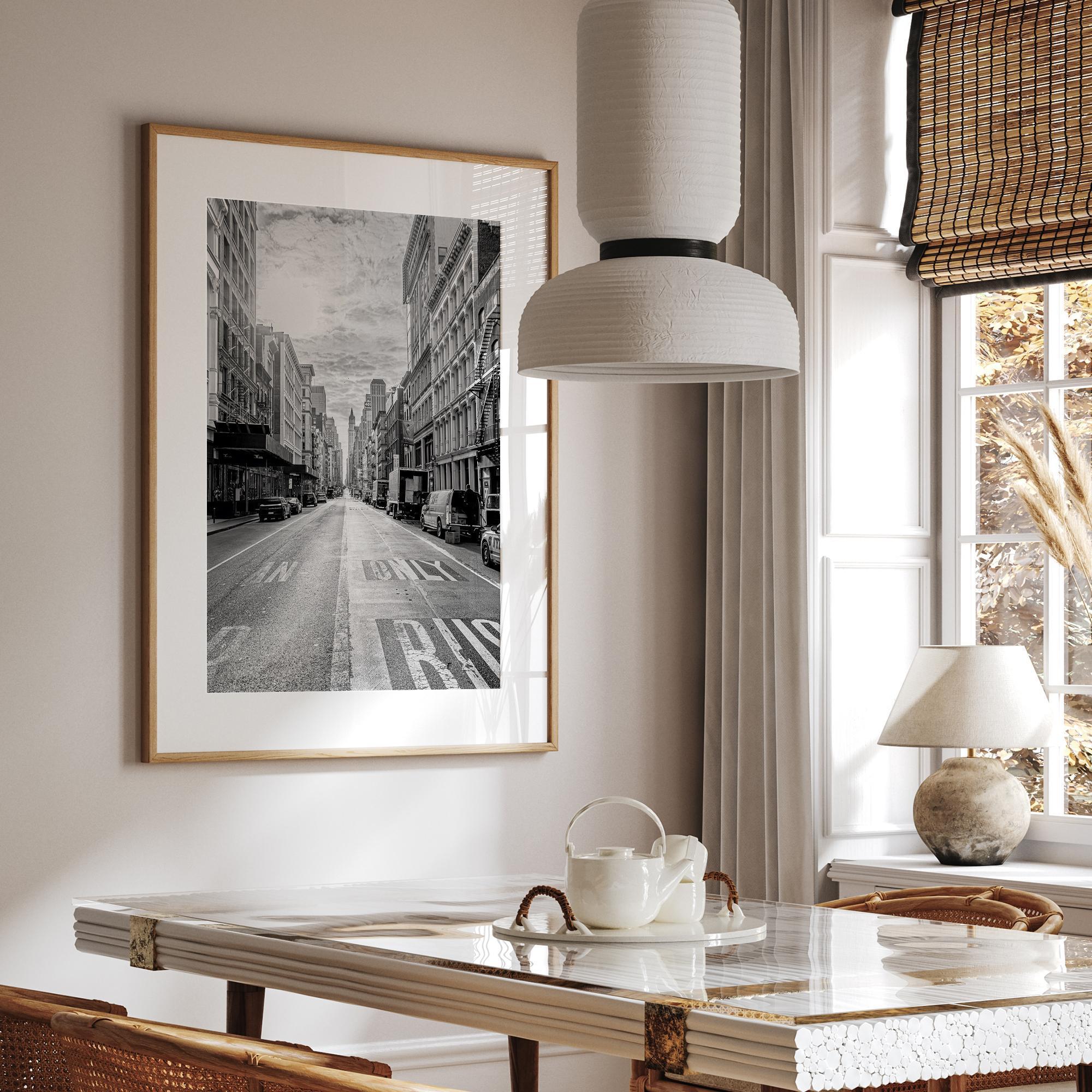 Black and white fine art print of a classic New York City street, showcasing the city's unique architecture.