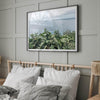 Tropical ocean view with lush green foliage overlooking the Pacific from Kauai, captured in fine art photography.