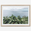 Tropical ocean view with lush green foliage overlooking the Pacific from Kauai, captured in fine art photography.
