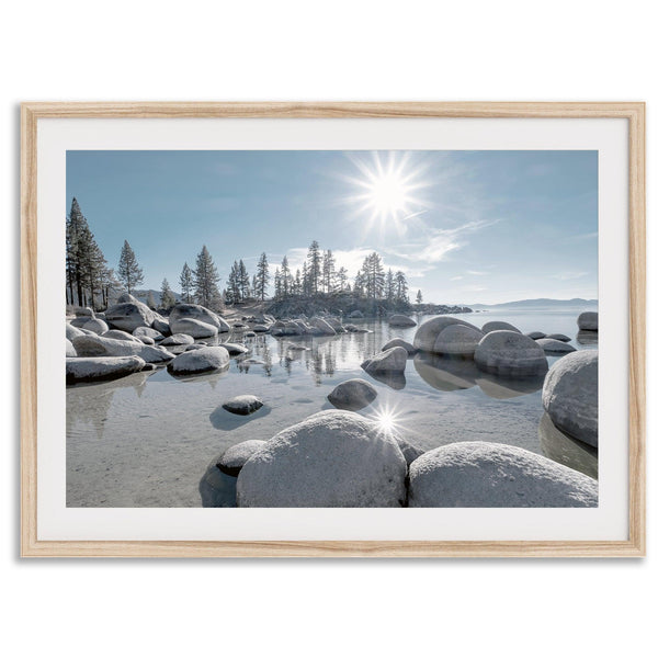 Lake Tahoe wall art featuring Sand Harbor’s boulders, pine trees, and water reflections at sunrise.