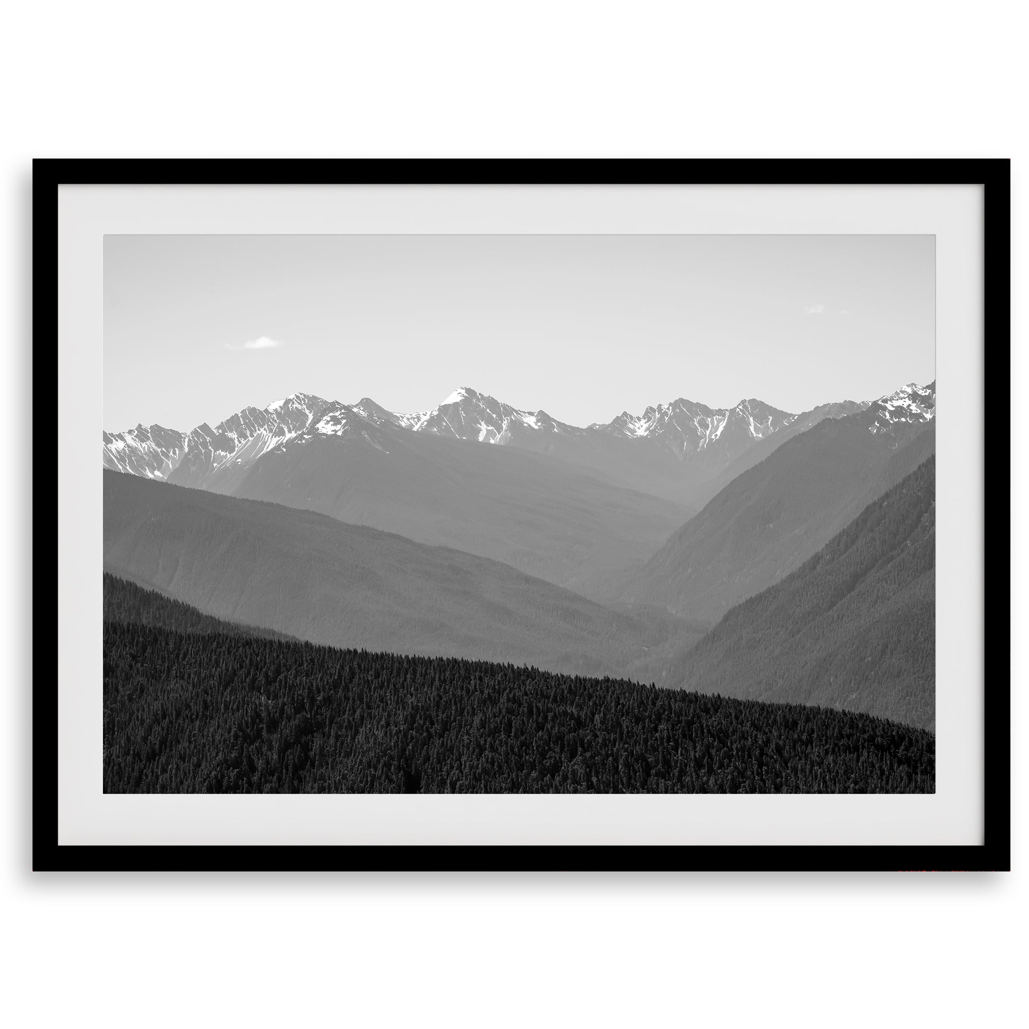 Black and white mountain photography wall art showcasing multiple layers of snowy mountain ranges. 