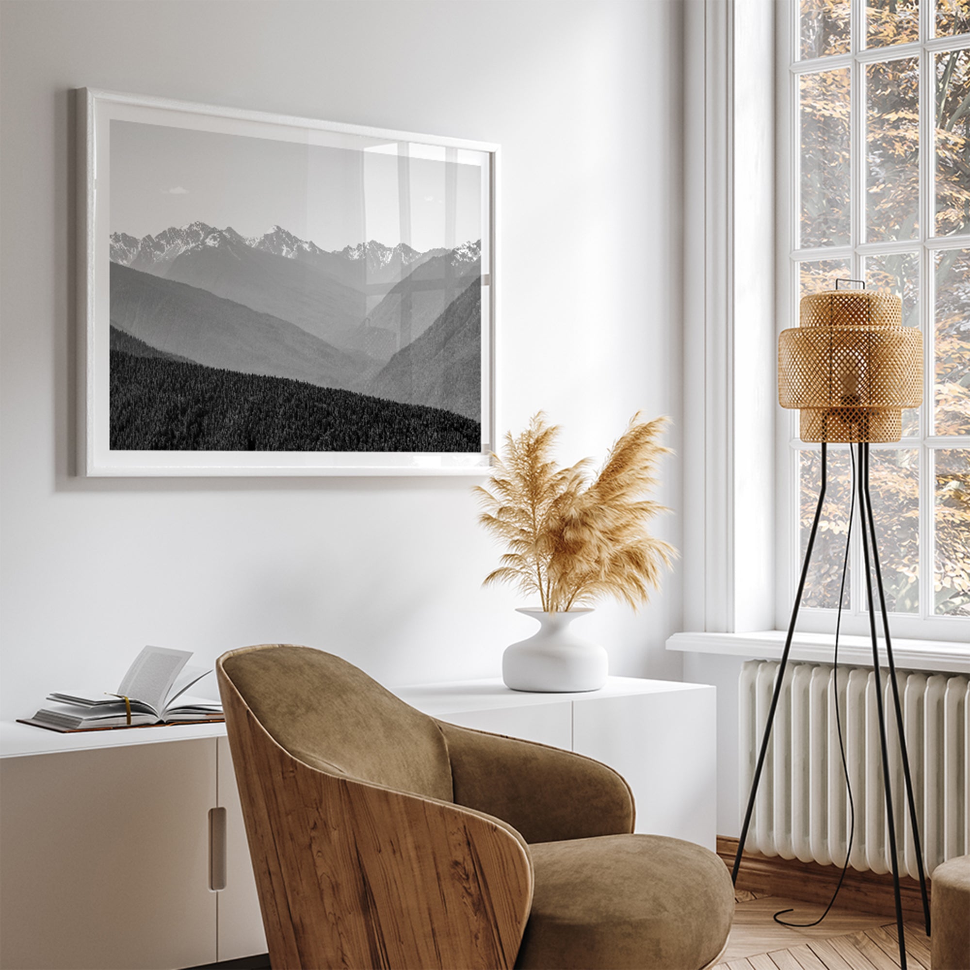 Black and white mountain photography wall art showcasing multiple layers of snowy mountain ranges. 