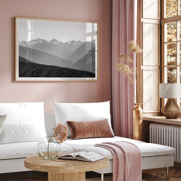 Black and white mountain photography wall art showcasing multiple layers of snowy mountain ranges. 