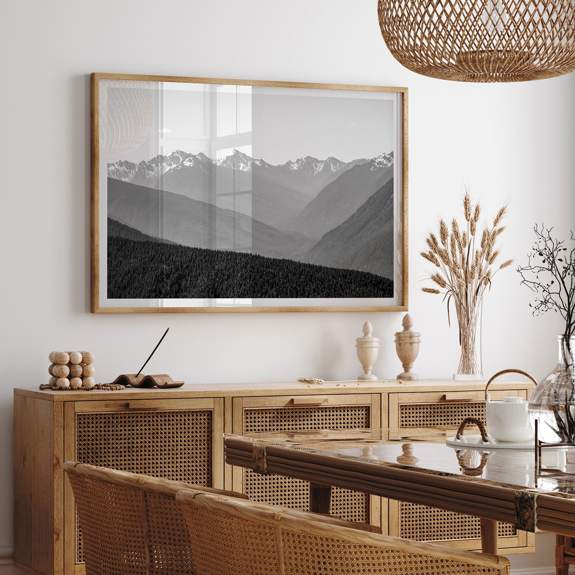 Black and white mountain photography wall art showcasing multiple layers of snowy mountain ranges. 