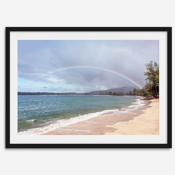 Modern coastal wall art featuring a Kauai beach with a vivid rainbow over turquoise ocean waters and golden sand