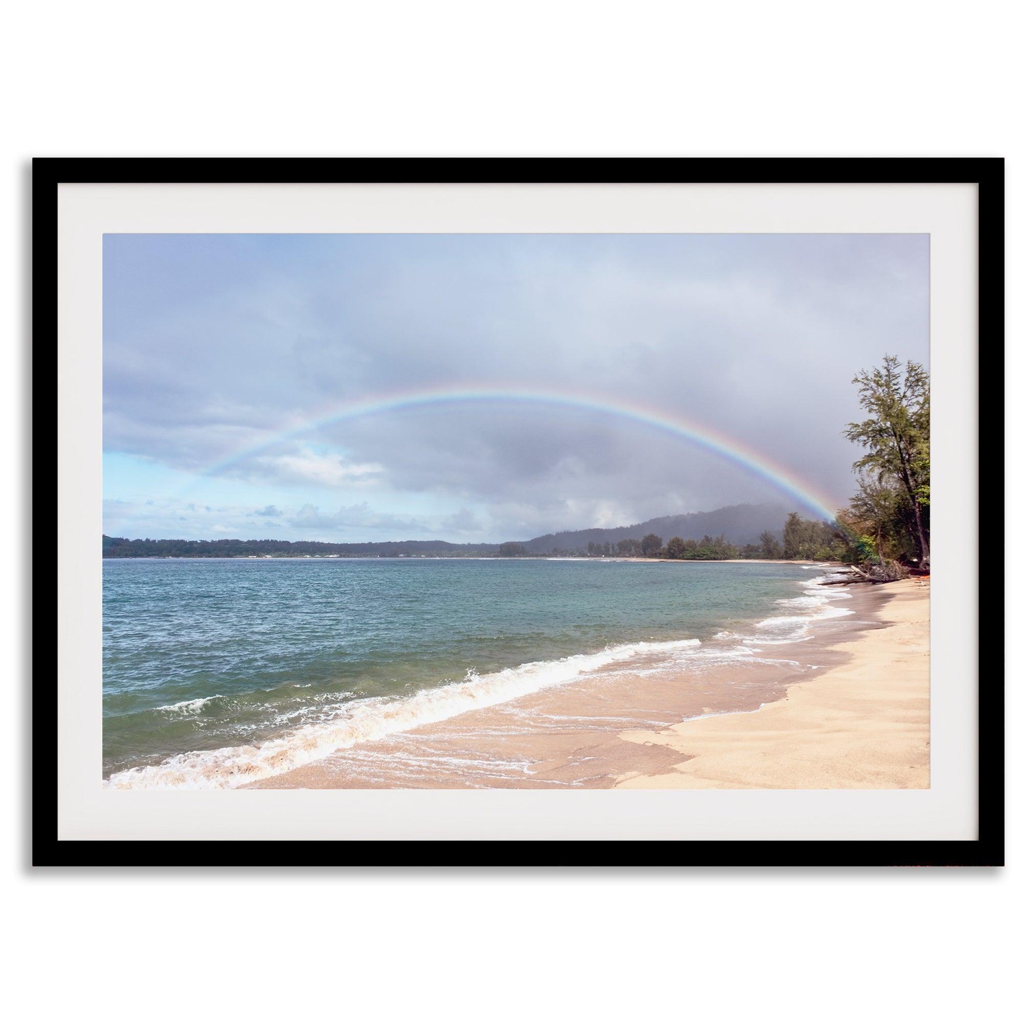 Modern coastal wall art featuring a Kauai beach with a vivid rainbow over turquoise ocean waters and golden sand