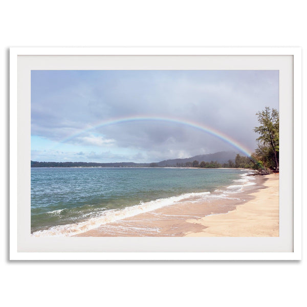 Modern coastal wall art featuring a Kauai beach with a vivid rainbow over turquoise ocean waters and golden sand