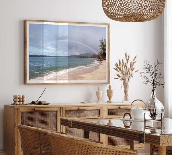 Modern coastal wall art featuring a Kauai beach with a vivid rainbow over turquoise ocean waters and golden sand