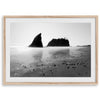 A fine art print of Ruby Beach in Olympic National Park, Washington. This black and white beach wall art features creamy waves in long exposure and dark-shaded towering rocks emerging from the ocean.