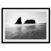 A fine art print of Ruby Beach in Olympic National Park, Washington. This black and white beach wall art features creamy waves in long exposure and dark-shaded towering rocks emerging from the ocean.