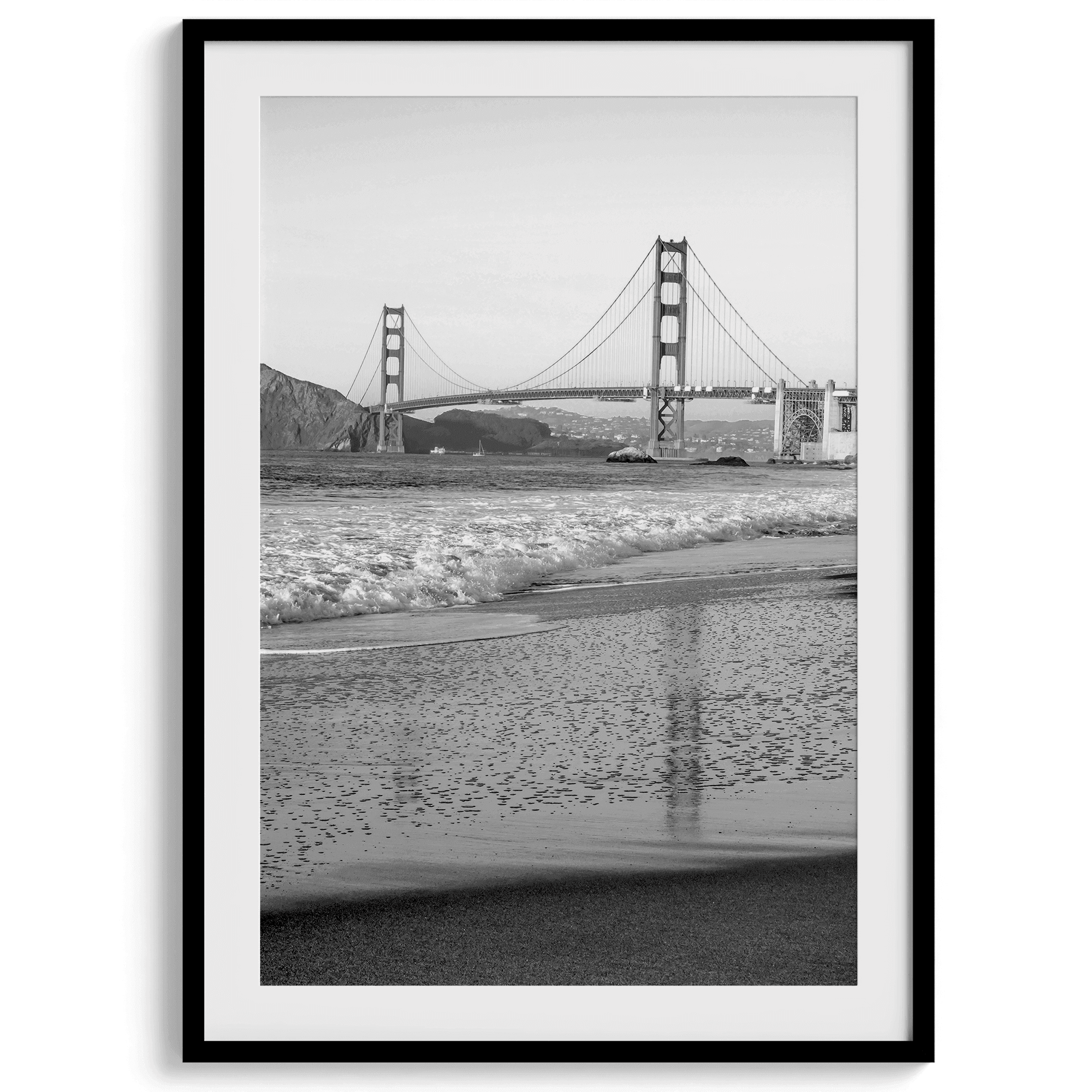 A fine art black and white print of the Golden Gate Bridge in San Francisco. This photo was taken from Baker Beach, showing the beautiful reflection of the bridge in the ocean. It is an excellent addition to your wall decor or a San Francisco gift.