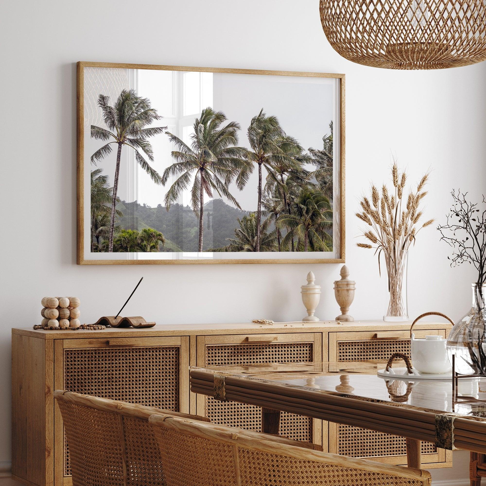 Tropical beach palm tree art with lush green palms against a misty hillside in coastal landscape