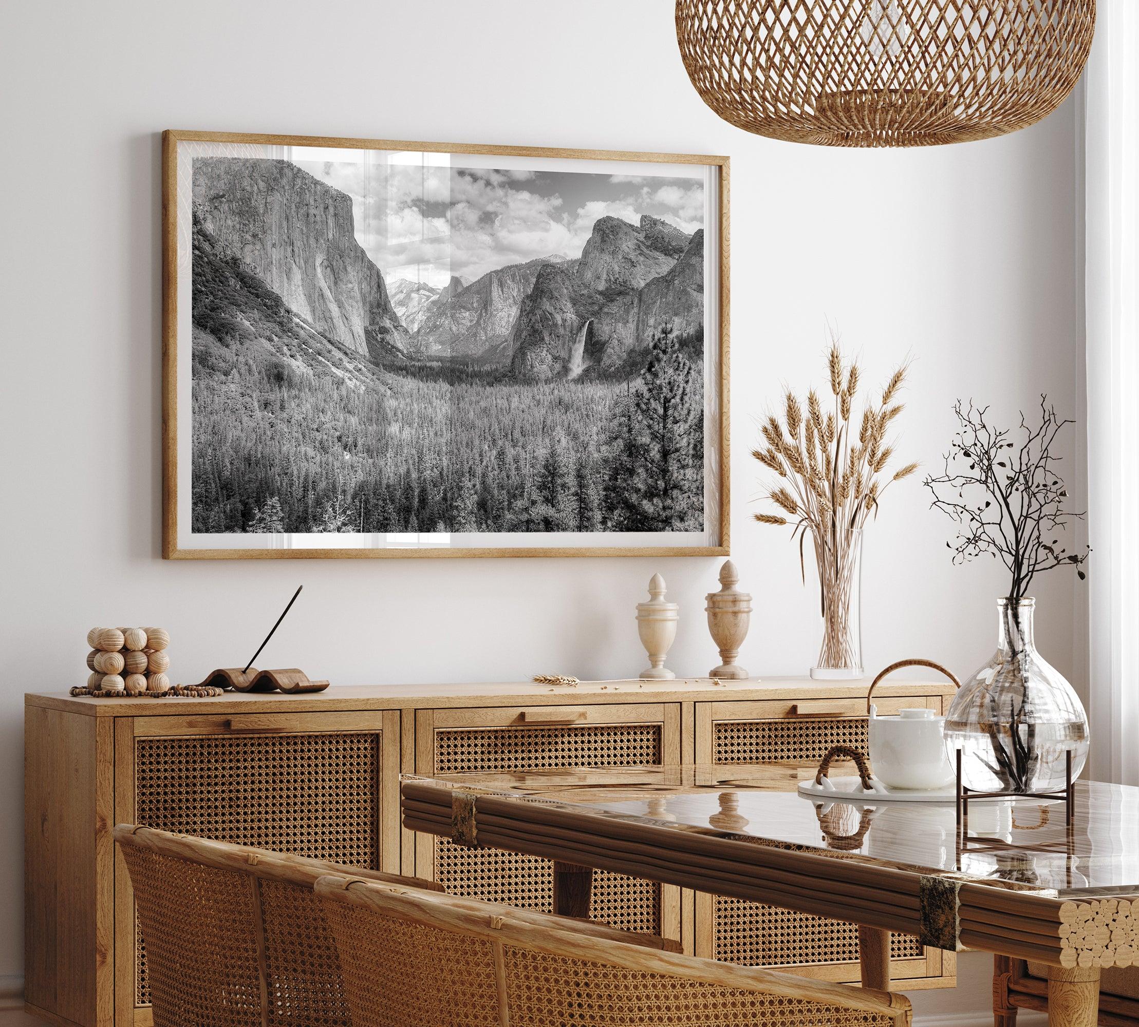 A breathtaking fine art black and white print of Yosemite valley during spring when the waterfalls are in full power.