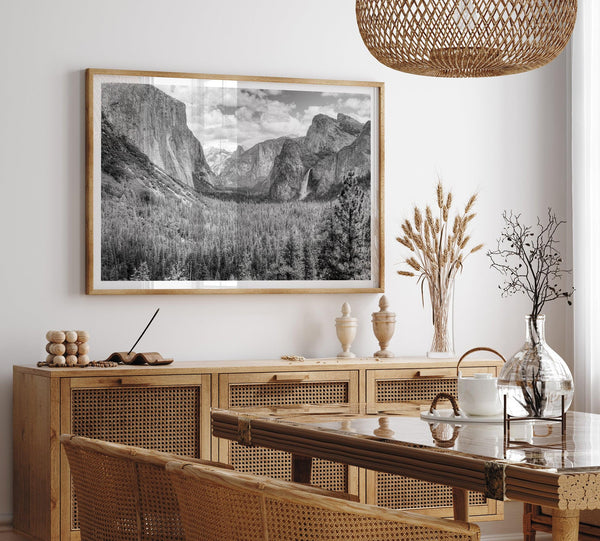 A breathtaking fine art black and white print of Yosemite valley during spring when the waterfalls are in full power.