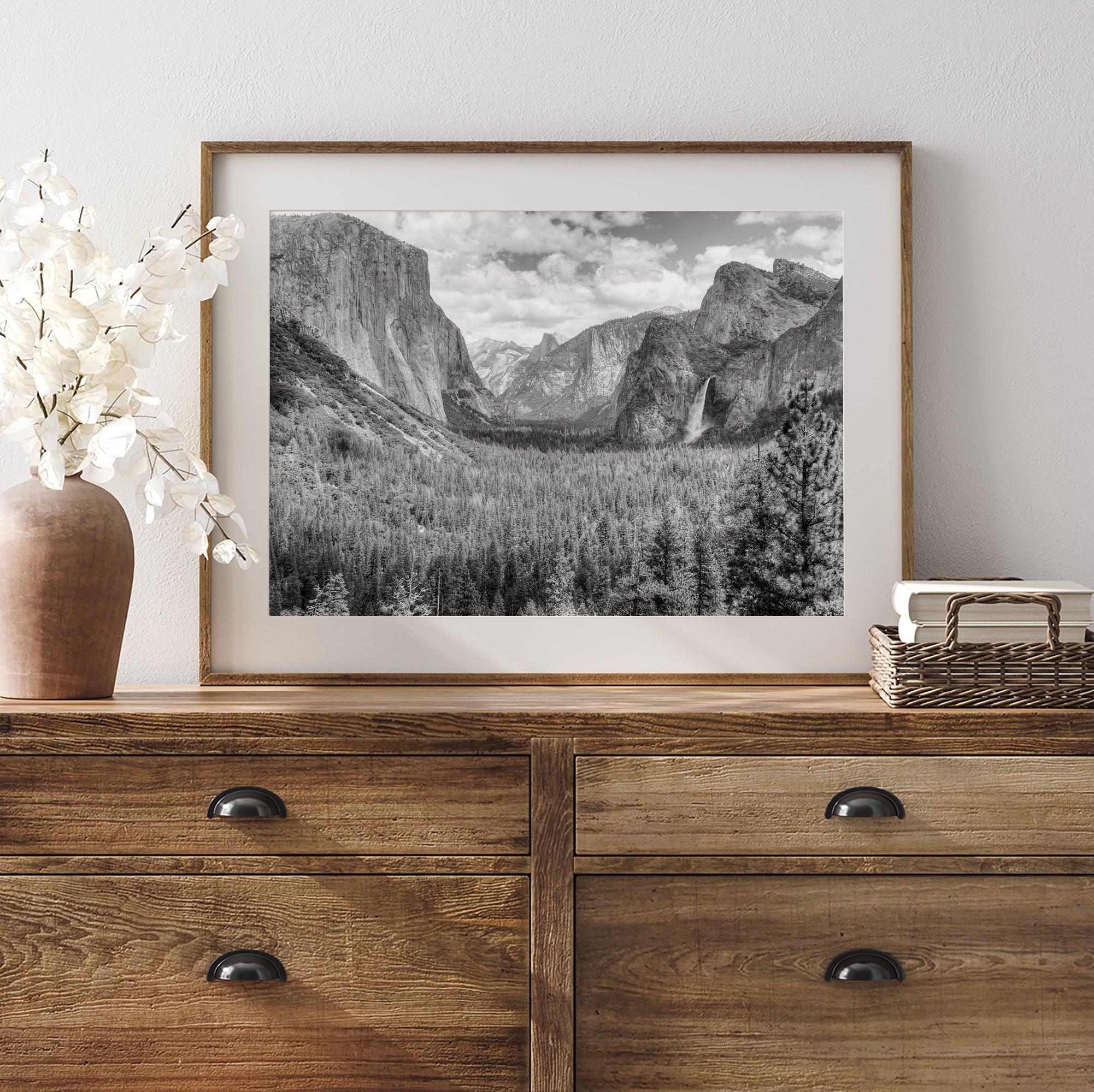 A breathtaking fine art black and white print of Yosemite valley during spring when the waterfalls are in full power.