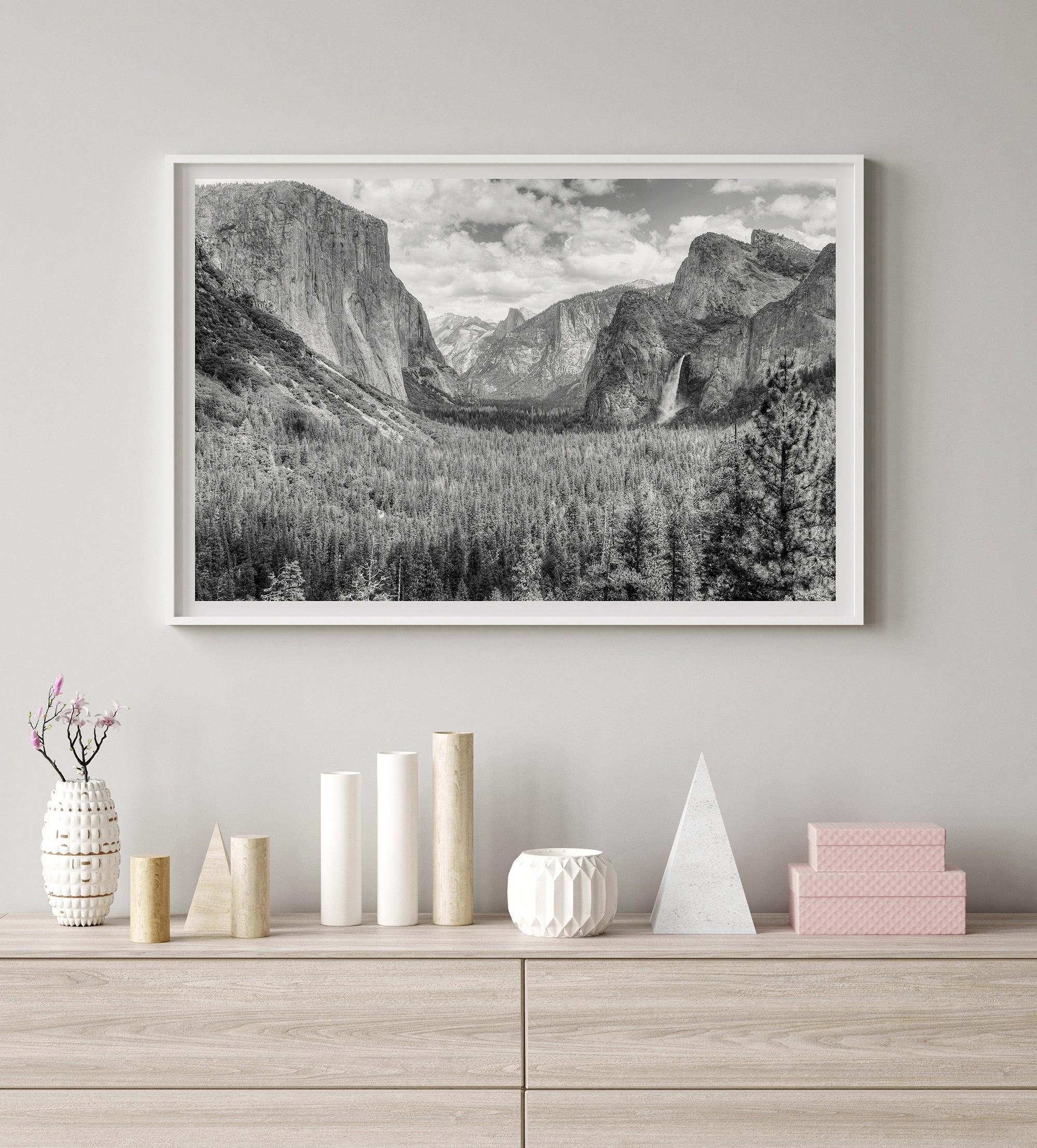 A breathtaking fine art black and white print of Yosemite valley during spring when the waterfalls are in full power.