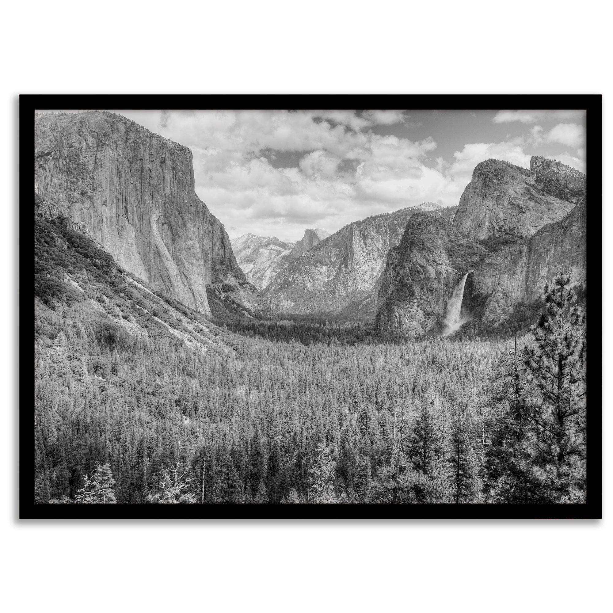 A breathtaking fine art black and white print of Yosemite valley during spring when the waterfalls are in full power.