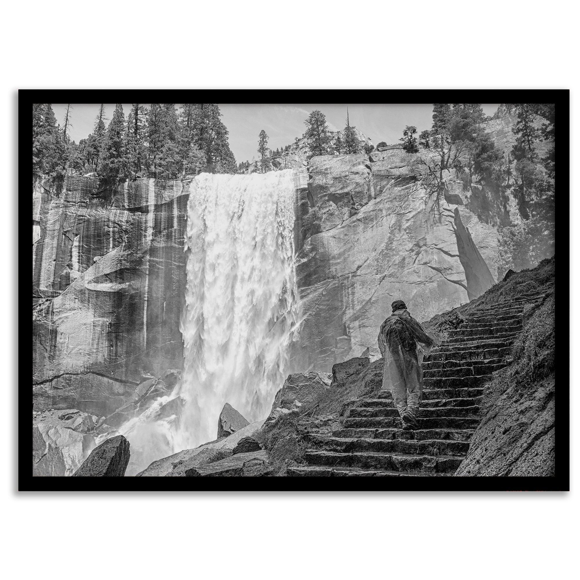 Climb the breathtaking Mist Trail in Yosemite National Part with this fine art black and white waterfall nature print. This nature landscape wall art showcases the stunning gushing waterfall and the people scaling the trail with their colorful raincoats.