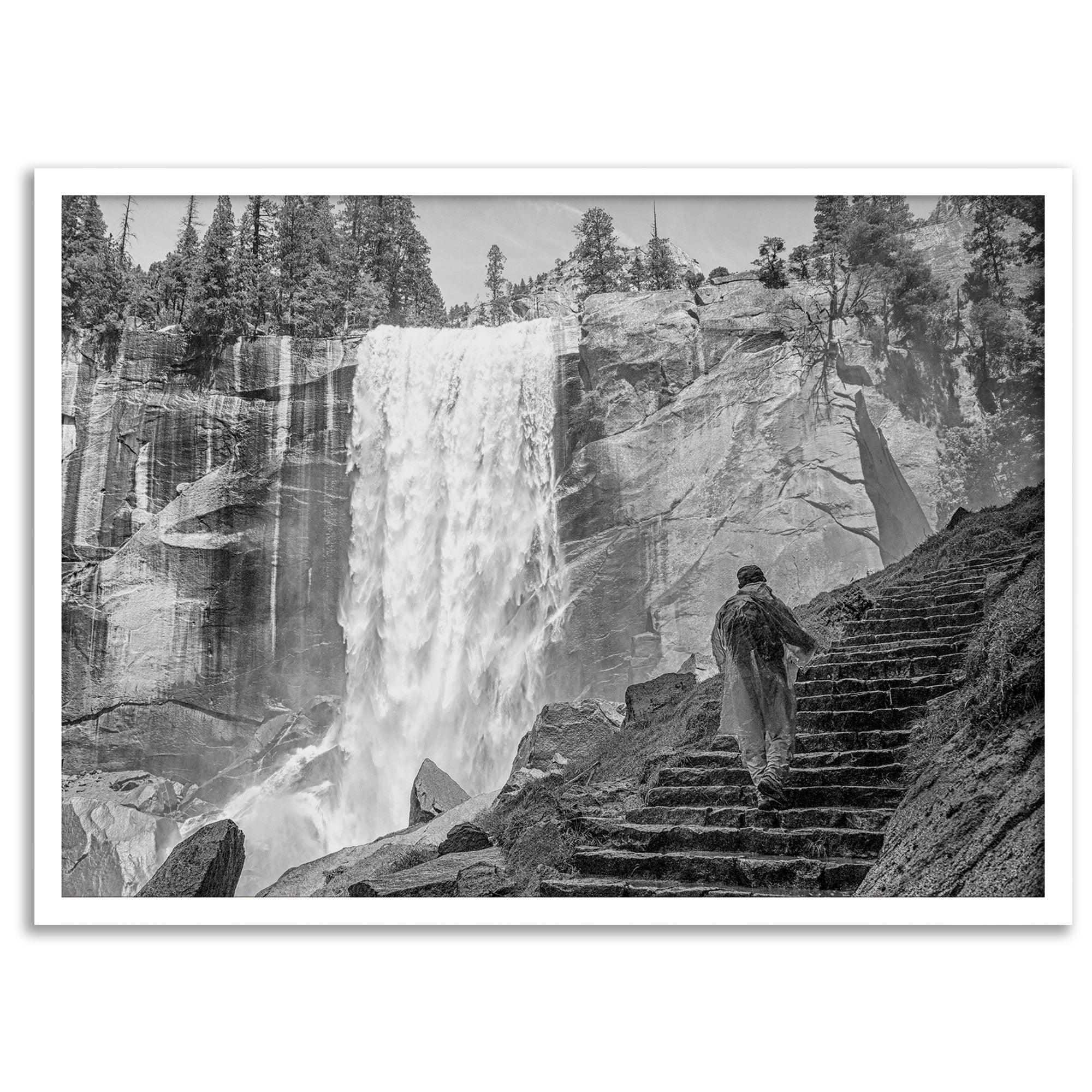 Climb the breathtaking Mist Trail in Yosemite National Part with this fine art black and white waterfall nature print. This nature landscape wall art showcases the stunning gushing waterfall and the people scaling the trail with their colorful raincoats.