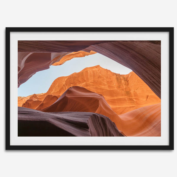 Framed fine art print of Antelope Canyon in Arizona, showcasing layered desert rock formations with rich colors and smooth textures.
