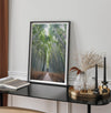 Vertical bamboo forest photograph from Arashiyama, tranquil path and glowing greens, premium bamboo wall art