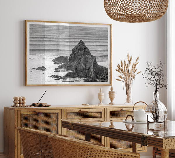 Black and white seascape wall art featuring minimalist  ocean waves and rugged coastal rock formations