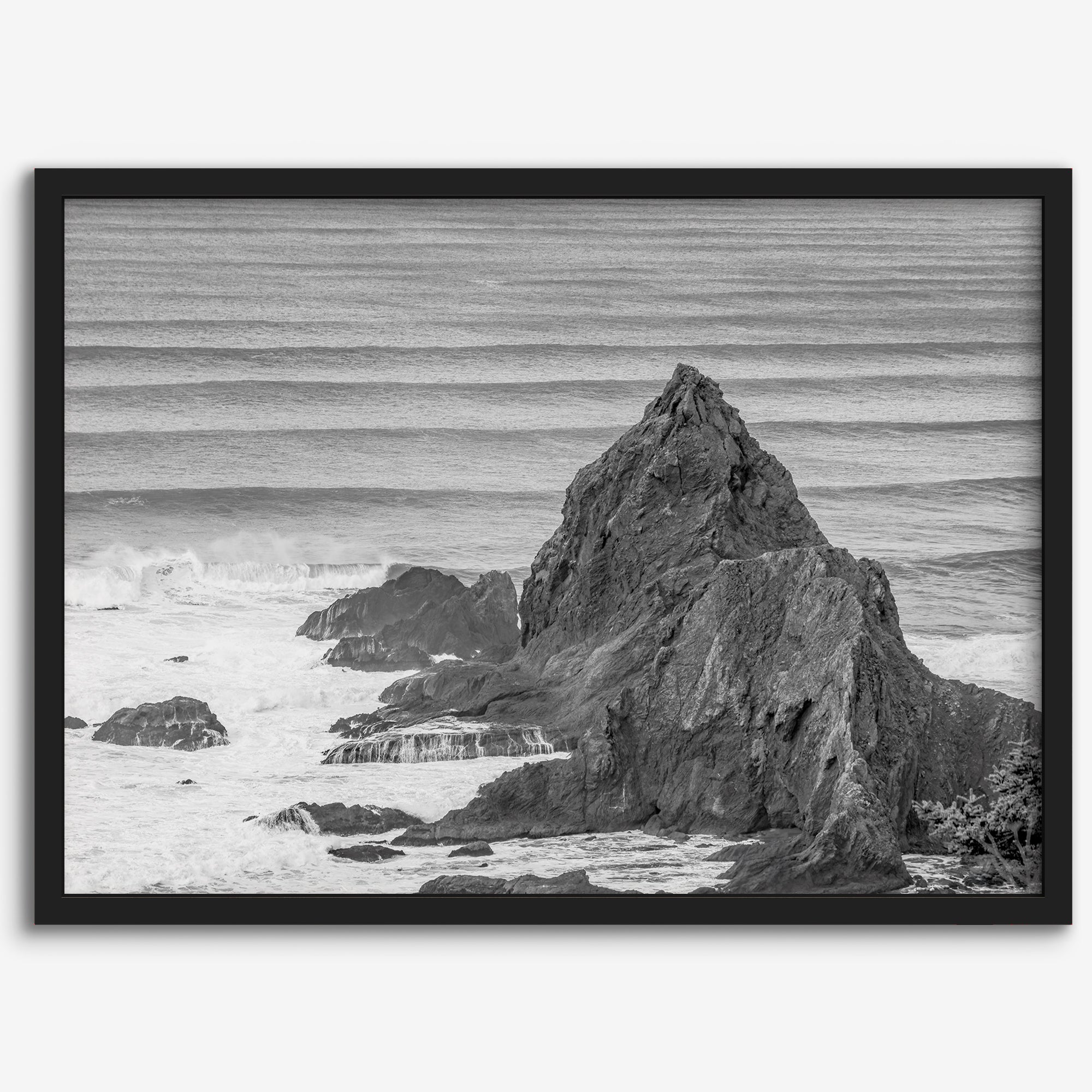 Black and white seascape wall art featuring minimalist  ocean waves and rugged coastal rock formations