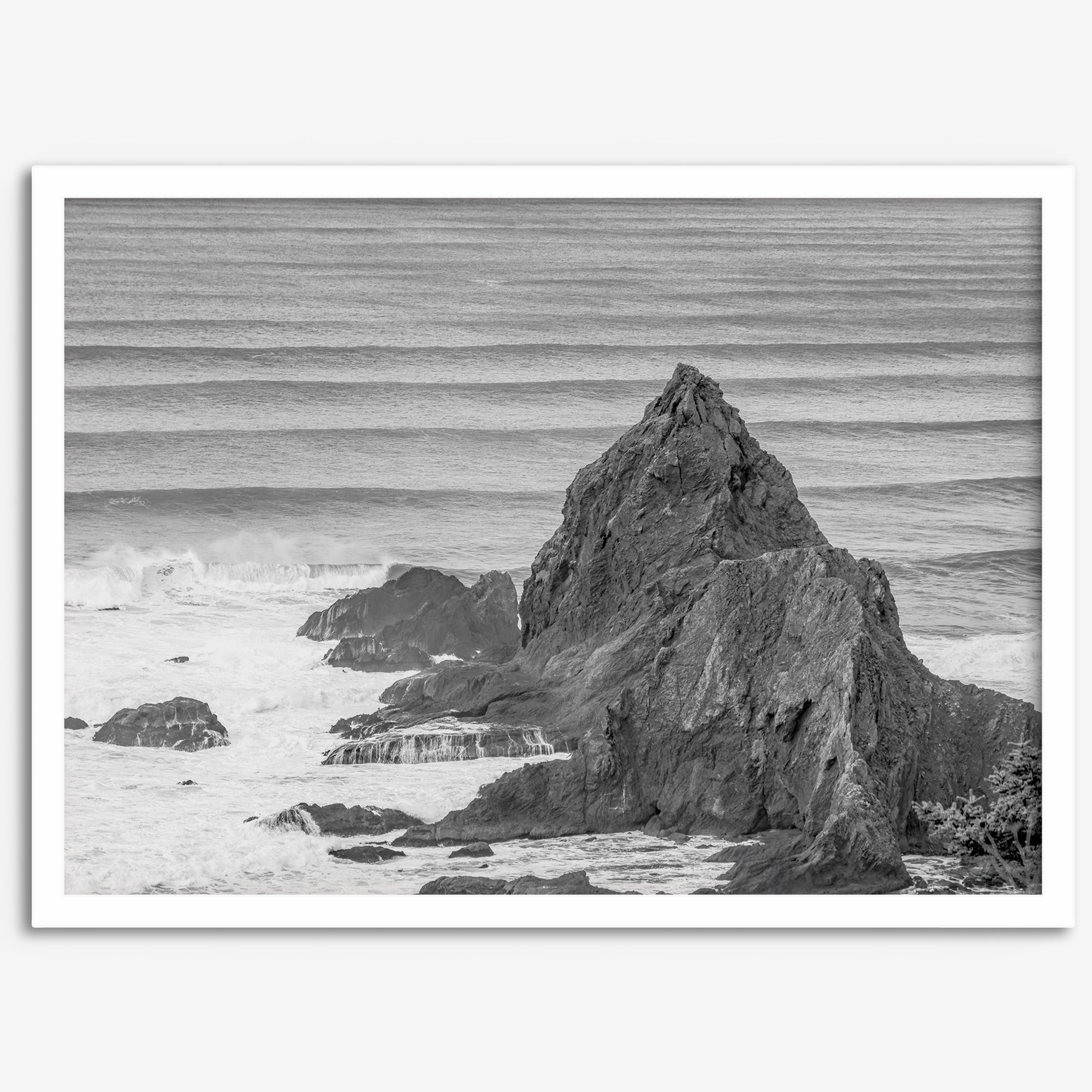 Black and white seascape wall art featuring minimalist  ocean waves and rugged coastal rock formations