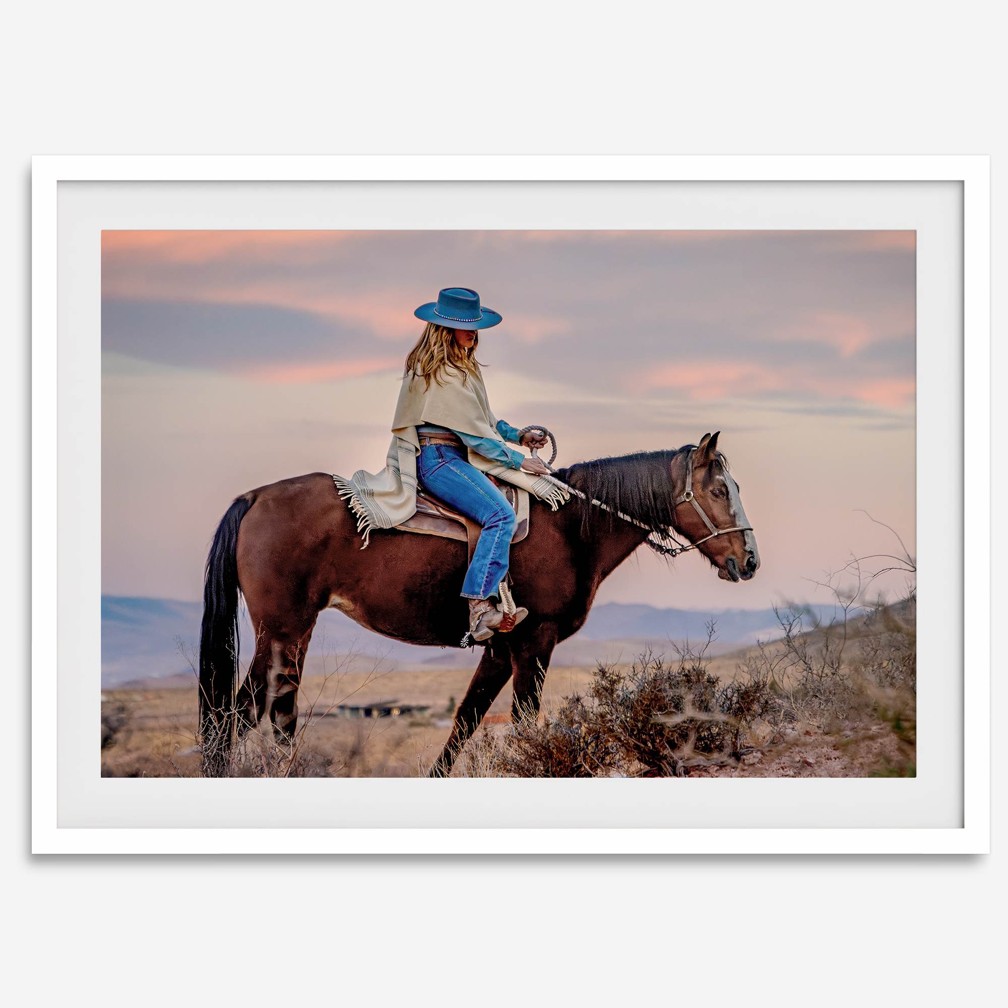 Cowgirl on horseback at sunset in desert landscape – rustic western wall decor print