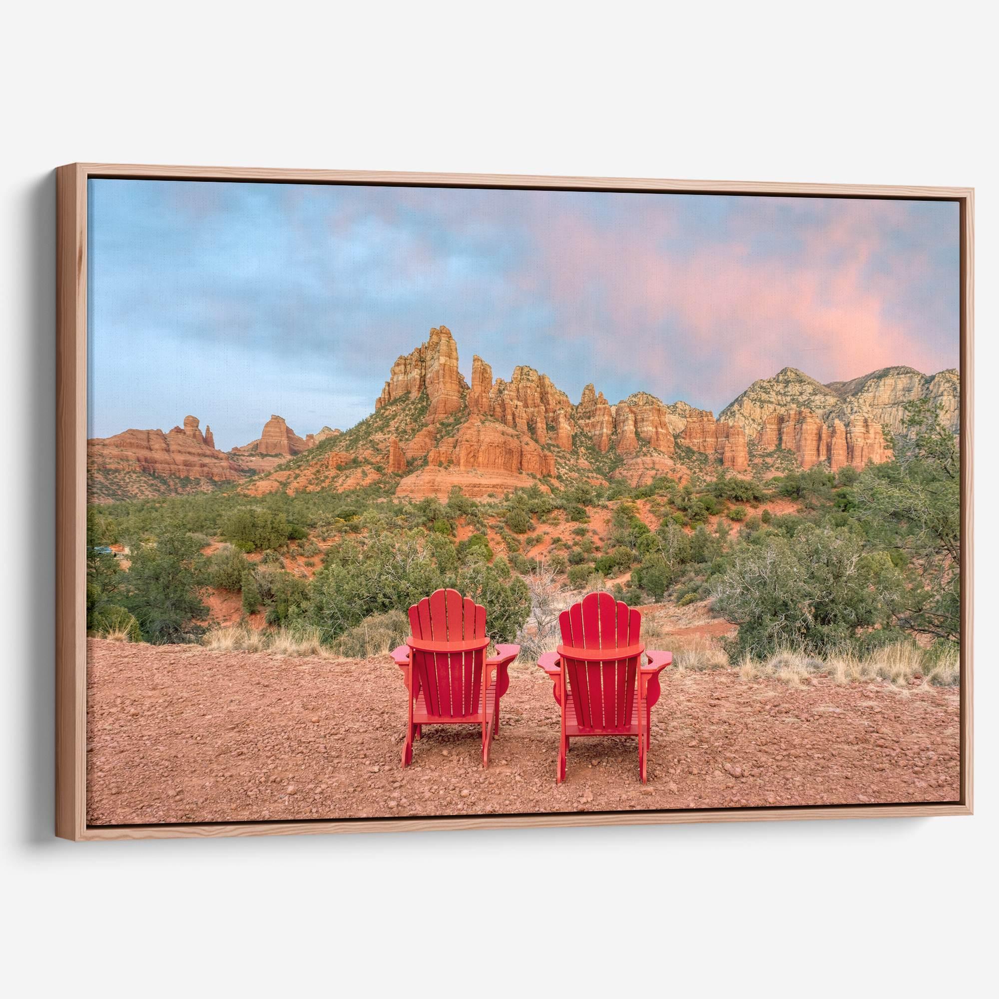 Framed or stretched canvas print of two red chairs facing desert mountains at sunset in Sedona, Arizona – fine art landscape