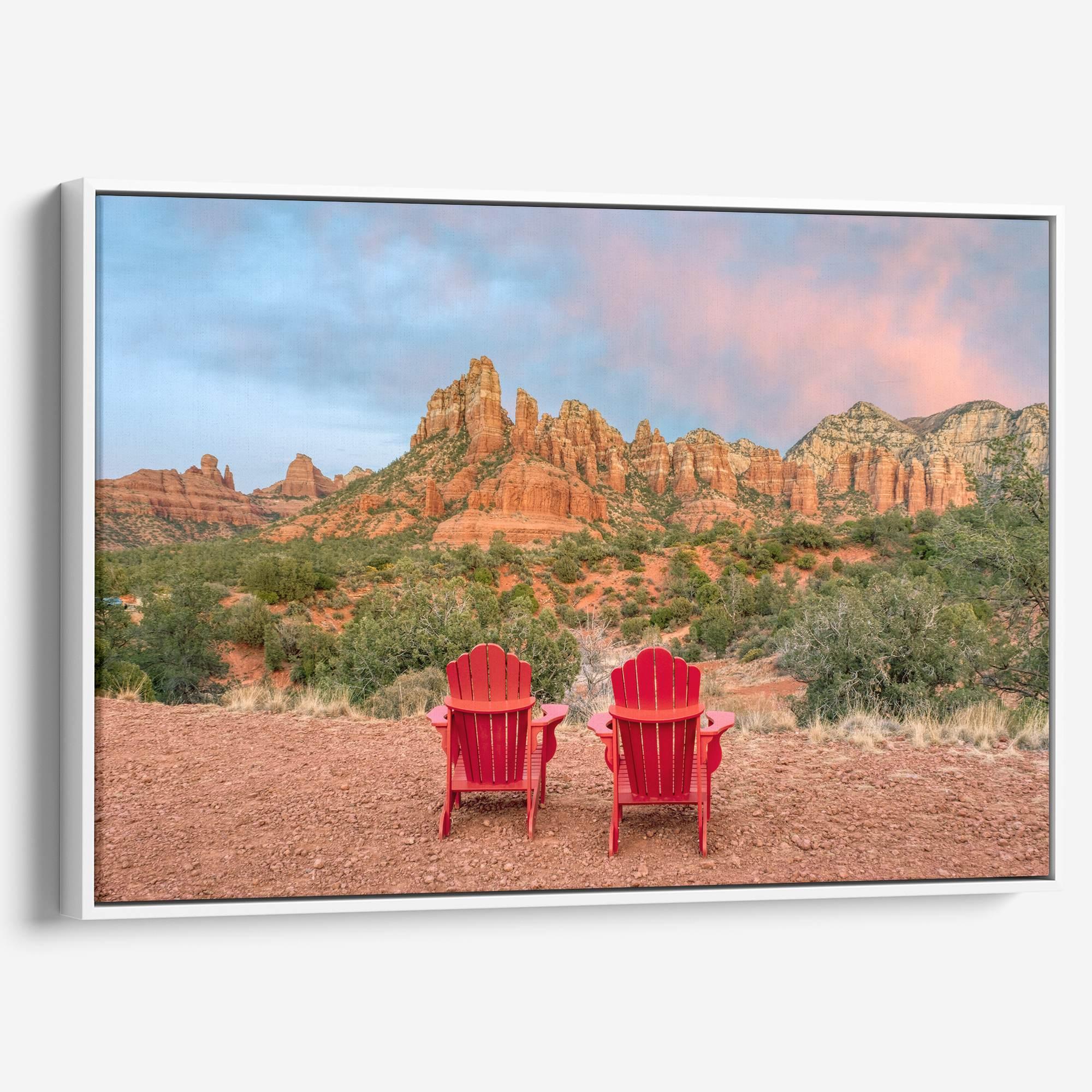 Framed or stretched canvas print of two red chairs facing desert mountains at sunset in Sedona, Arizona – fine art landscape